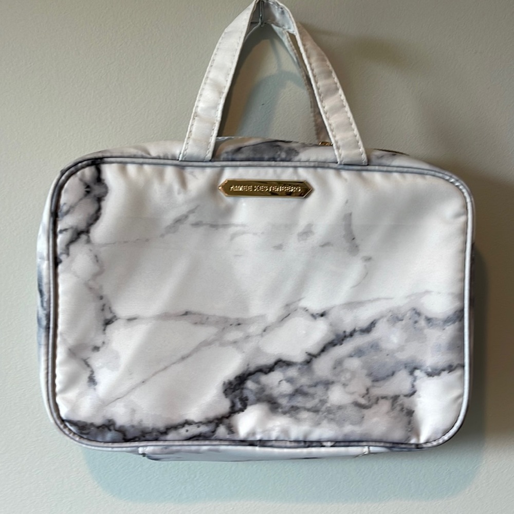 Aimee Kestenberg white marble hanging travel cosmetic bag